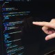 finger-pointing-at-javascript-code_4460x4460